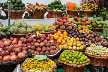 Fototapeta na wymiar Fresh exotic fruits in Mercado Dos Lavradores. Funchal, Madeira, Portugal