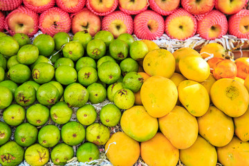 Mango, lime, apples in  Indian market.