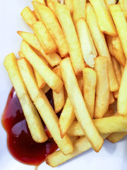 Golden French fries potatoes ready to be eaten