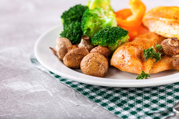 Healthy lunch - chicken fillet, mushrooms, broccoli and paprika. Selective focus. Copy space