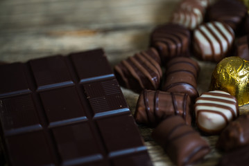 Variety of sweet homemade chocolate pralines and chocolate bars