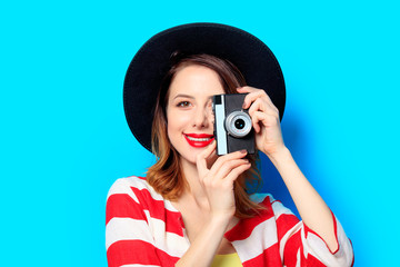 Woman with vintage camera