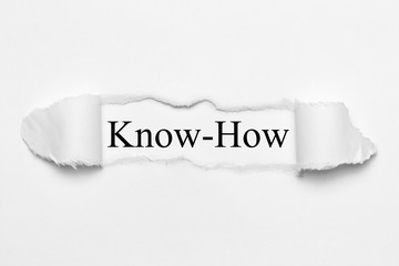 Fototapeta premium Know-How on white torn paper