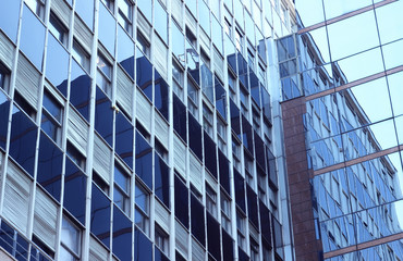 Fototapeta na wymiar Rows of windows on a building