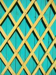 Wooden fence with rhombuses