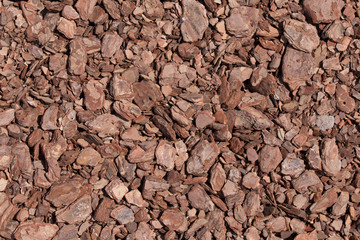 Crushed tree bark brown texture background. Shredded tree bark for decoration.