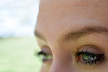 Close up of young woman's hazy eyes. Selective focus.