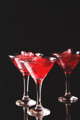 Strawberry daiquiri cocktail with lime, strawberry, cherry and mint