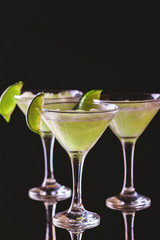 Classic daiquiri cocktail with lime, ice and mint
