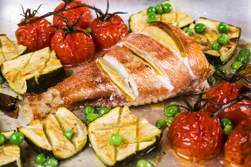 Baked fish with vegetables