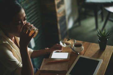 Having glass of fresh juice