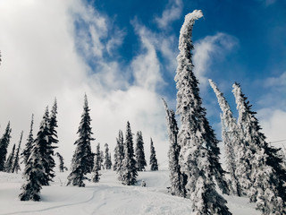 Snowy landscape Sheregesh, Kemerovo region, ski resort with a cabin lift in the background of mountains. Concept road for downhill skiing and snowboarding.