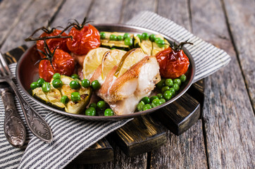 Baked fish with vegetables