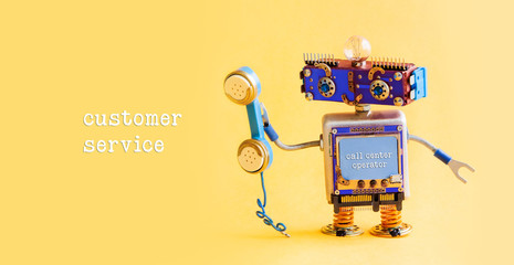 Customer service call center operator concept. Friendly robot assistant with retro styled phone on...