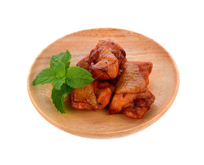 Roasted chicken bush in wood plate isolated on white background
