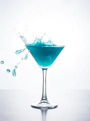 Blue curacao cocktail with splash