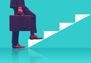 Businessman holding briefcase walking on graphic stair, start up business concepts.