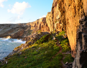 Beautiful Sunset at West Coast of Algarve between Praia do Amado and Cabo de Sao Vincente