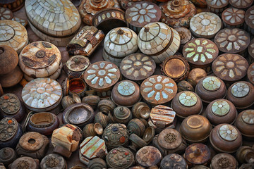 Vintage handmade metal and pearl jewelry boxes on market. Rajasthan, India