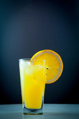 Orange juice and slices of orange fruit
