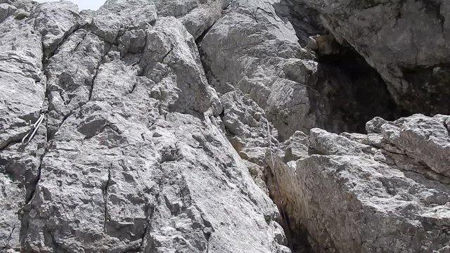 
two ropes on a rock with a vertical view up