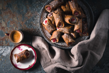 Sacilian traditional cannoli on a tin plate