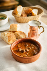 turkish food kofta is meatballs in tomato source and bread