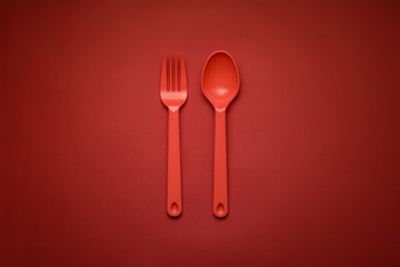Red Fork & Spoon on red background