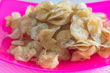 Dried banana slice on plate - crispy