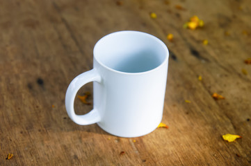Empty White Mug Over Wooden Table