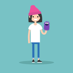 Young female character playing with a hand puppet / flat editable vector illustration, clip art