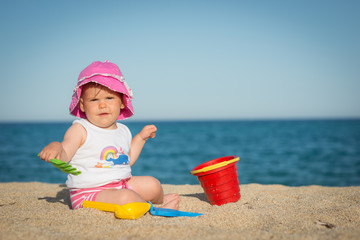 Caucasian little girl playing with bach toys