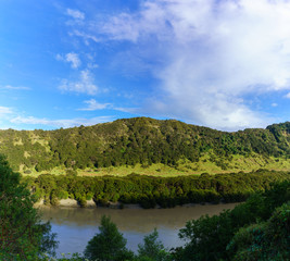 Fototapeta premium Panoramic beautiful scenery of mountain and river along the way on Whanganui river road in National Park in Autumn , Whanganui , North Island of New Zealand