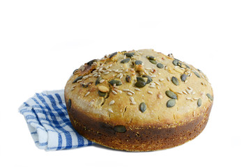 Crusty homemade fresh bread on a white background.