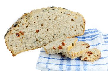 Crusty homemade fresh bread on a white background.