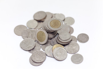 Coin, Thai currency in background and isolated
