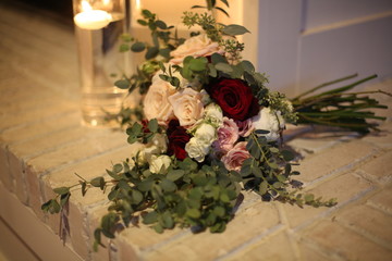 Wedding Bouquet on a White Brick Fireplace Hearth