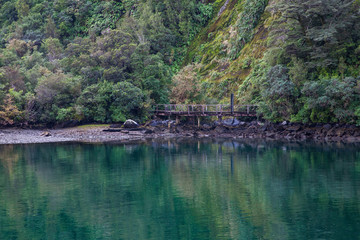 Fototapeta premium Reflection lake at Milford Sound, Fiordland national park, New Zealand