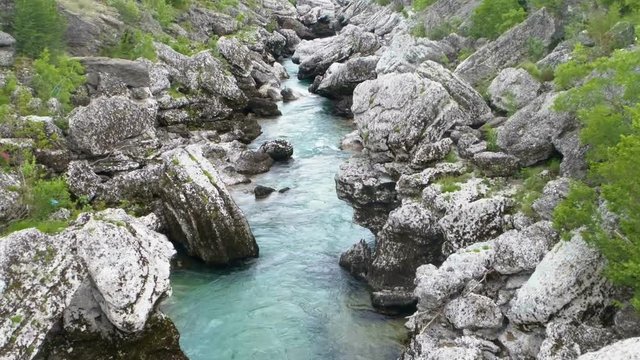 Cijevna river flows among the huge stones. Montenegro. Aerial.