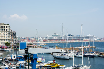 Naples marina, cruise ships visible