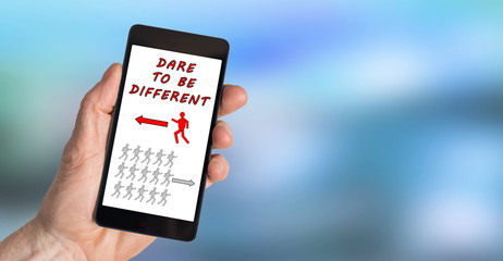 Dare to be different concept on a smartphone