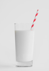 milk with straw isolated on white background