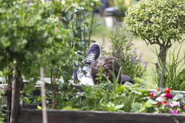 young man relaxing in an urban garden