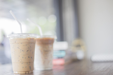Plastic Coffee Cup on Wooden Table