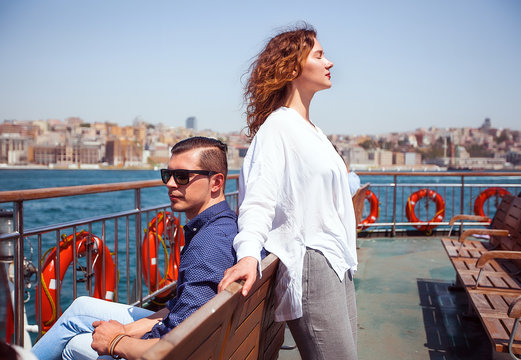 Young tourist couple on passenger ferry deck, Beyazit, Turkey