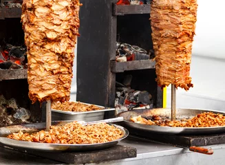 Keuken spatwand met foto Closeup picture of stacked meat roasting, shawarma © Nobilior