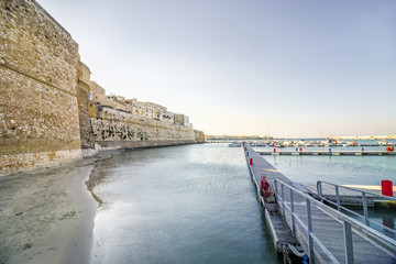 Aragonese castle and sandy beach in Otranto, Apulia, Italy