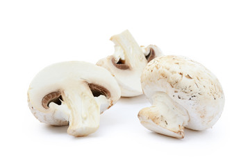  Fresh champignon mushrooms isolated on white background