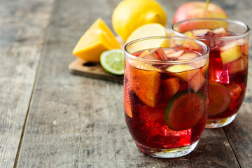 Sangria drink in glass on wooden table
