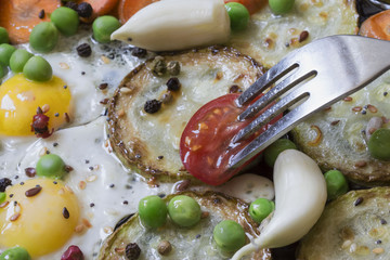 Breakfast of delicious vegetables on a large frying pan close